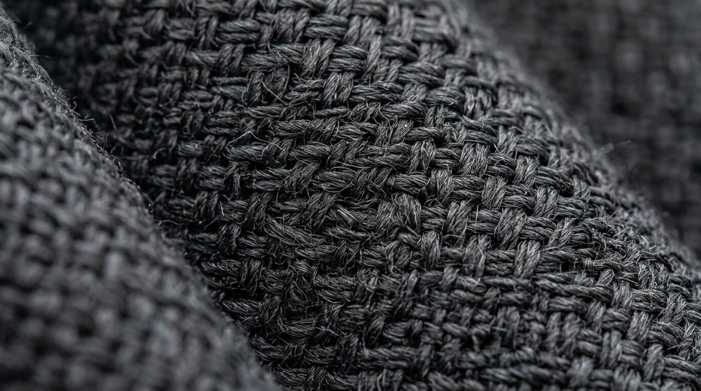 Premium garment manufacturing at DISTRICT 88 — fabric and production detail